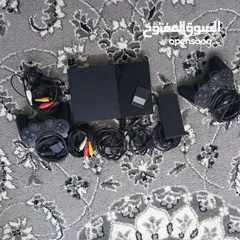  1 بلايستيشن 2 مع كامل أغراضها زي يلي بالصورة ركز فيها و تعال  قابل للتفاوض