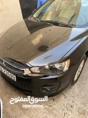  2 سيارة ميتسوبيشي لانسر فراشة