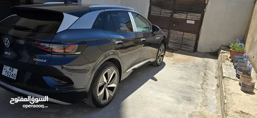  11 2024 ID 4 crozz pro piano black برو بيانو بلاك عداد زيرو كفالة اتوهب 6 سنوات أو 100 ألف كيلو متر