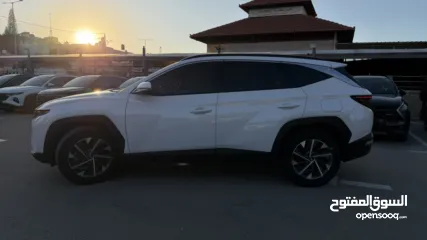  14 هونداي توسان ترخيص 2023 محرك 1600 هايبرد جير أوتوماتيك 240 حصان