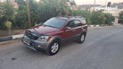 1 جيب كايا سورنتو موديل 2008_(ركاب 6+1)ديزل ماتور 2500دفع رباعي فل فل اضافات مع فتحة سقف مميز من الاخر
