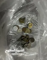  3 عملات قديمه وطوابع وتليفونات قديمه