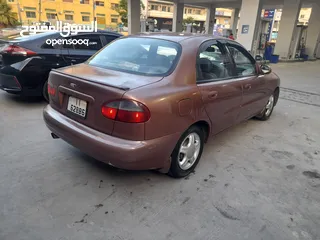  5 دايو لانوس موديل 1997 جير عادي ماتور 1500 سنتر اصلي جنط الاصلي فحص مرفق
