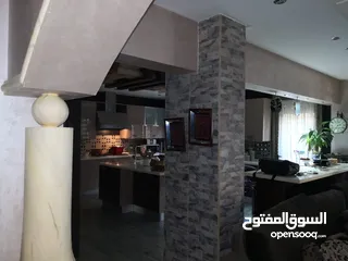  7 قطعة ارض 716م2 عليها عمارة اربعة طوابق وقبو في الصويفية
