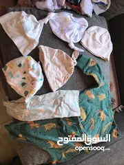  15 ملابس اطفال من عمر حديث ولادة ل عمر سنة .. بحالة الجديد وجميع الملابس براند.. سعر القطعة 50 قرش
