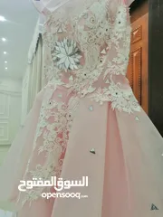  1 فستان جديد لم يستخدم الا مره واحده سعره 15ريال عماني