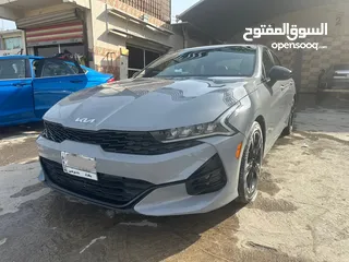  1 كيا k5 gt line 2023 اسمنتي للبيع