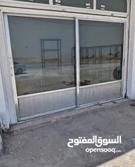  1 باب سحاب المنيوم السلفر الثقيل قياسه عرض مترين بطول متر و90سم مع كامل عدته
