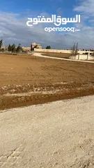  9 قطع اراضي قرب الشارع الرئيسي ارينبة الغربية بالقرب من مسجد خلف المحاكيم شارع المطار