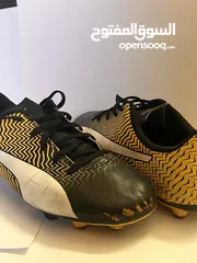  1 Unisex Puma kids football shoes (yellow) -  حذاء اطفال لون اصفر لكرة القدم (صالح للجنسين)
