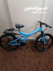  1 بسكليت جنط 26 لون ازرق قابل للطوي بحاله الوكاله ولا خدش مع الكفاله 1 سنه إقرأ الوصف bike