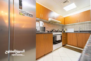  23 دبي لاند SKYCOURT  غرفة وصالة  مفروشة  سوبرلوكس مع بلكونه-إيجار شهري شامل