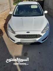  1 فورد فوكس 2015 لون ابيض عادي