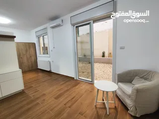  18 شقة جديدة مفروشة مع حديقة للإيجار – عين منجد  شارع إسكان المهندسين