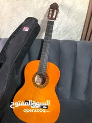  10 جيتار Valencia CG160 جديد غير مستعمل مع شنتة وريشة وآلة دوزان الاوتار كلو مع تشطيب لامع طبيعي للخشب