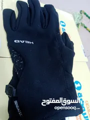  4 كلفز كفوف رياضة أمريكي ماركة HEAD ضد الماء water proof بحالة الجديد.. ميزة استخدام التصفح في الهاتف