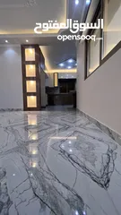  15 شقه طابقيه اربع غرف نوم الزرقاءالجديده شارع الونك  خلف فندق الجوابره مع مطبخ للبيع