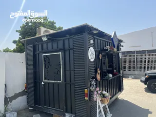  11 drive through  عربة لبيع الكوفي