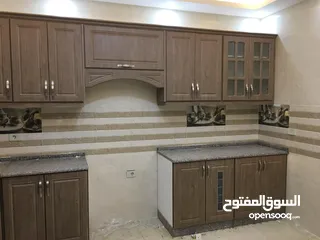  15 نجار متنقل في مدينه السلط لكافه اعمال النجاره تفصيل تركيب وفك الاثاث وصيانه