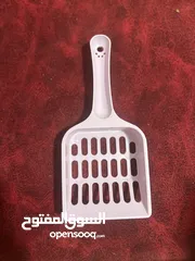  9 مستلزمات قطه مستعمله استعمال بسيط وبحاله ممتازه مشط -شامبو-مقص اظافر-رمل نص الكيس -لتر بوكس-بوكس نقل