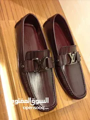  1 Prada and LV shoes for sale