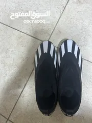 1 حذاء رياضي كرة قدم بحالة جديدة
