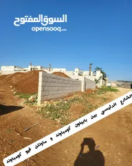  9 ارض استثمارية بشمال عمان / الاردن في كومباوند بابيلون باطلالة خلابة
