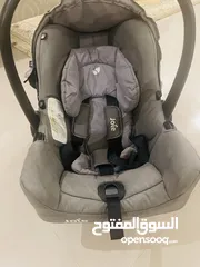  3 Joie car seat 1st stage , from new born to 13 kg , gray color , used in a very good condition