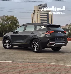  6 كيا سبورتاج هايبرد 2023 / فل كامل مع بانوراما وفرش مميز غرفه عسليه / عداد قليل / سعررر مميز جداً