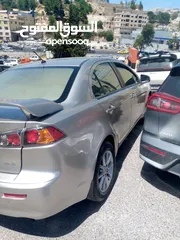  1 متسوبيشي لانسر فراشه EX  GLS  اعلى صنف