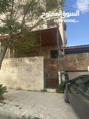  19 شقة ارضية للبيع بجبل الحسين ، شارع يافا ، عمارة 82 ، شقة 1 مع ترس وكراج سيارة