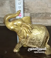  13 فيل نحاس منقوش
