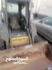  4 بوبكات نيو هولند