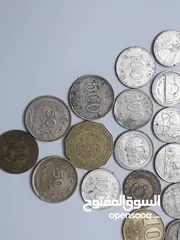  12 عملات معدنية قديمة كما موظح بالصور