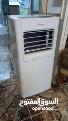  2 *مكيف غاز متنقل*