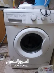  1 غسالة فستل 7 كيلو وثلاجة