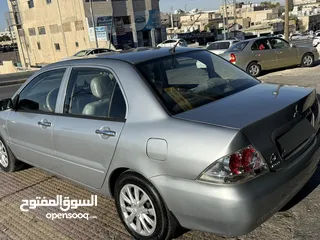  2 لانسر للبيع اقساط شخصي لون سلفر مميز 1.6 اصلي