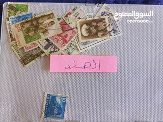  7 طوااابع من جميع دول العالم بنص دينار فقط