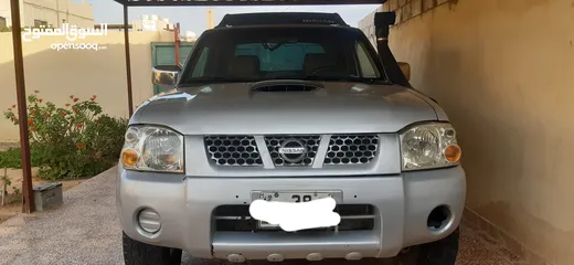  1 بكب نيسان بلدي 4×4 فورويل موديل 2004