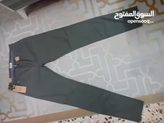  16 شروات ملابس رجالي بنطلون جينز وكتان وقميص وشرت البضاعه جديد البضاعه صنع تركي وصيني العدد 610
