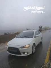  1 ميتسوبيشي لانسر. 2015 اصل برايفت   رخصة وتامين  ماطور 1600 اتومات  شامل  فتحة   اماكنية لبيع نص بنص