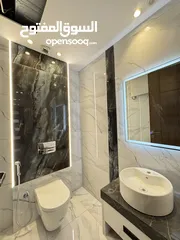  15 شقه شبه ارضي مميزة مساحة 240م مع تراس 200م بسعر مميز (مشروع 112)