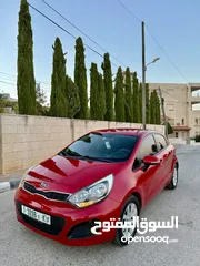  2 كيا برايد 2014 بنزين اتومات بالكرراتين يد 2