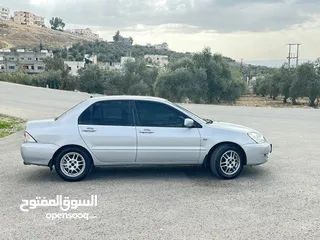 6 ميتسوبيشي لانسر 2007 ماتور 16 اتوماتيك  / وارد الكويت فحص كامل / كاش أو اقساط
