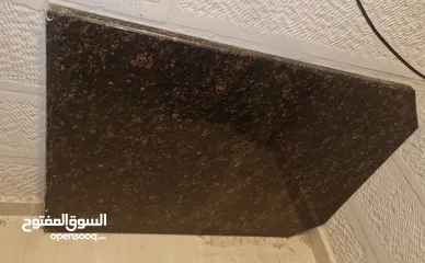  1 طاولة مطبخ رخام جرانيت أسود   طولها  115 والعرض 80