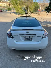  2 نيسان التيما موديل 2009 فل الفل مع فتحه أعلى مواصفات بحال الوكاله