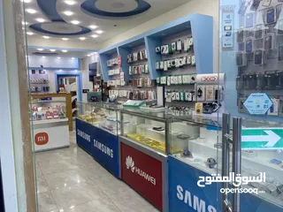  2 محل تلفونات شغال وسمعه ممتازه  للبيع