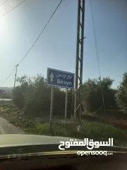  1 مزرعه للبيع في بيرين بالقرب من شفا بدران مساحه 3500 م قوشان مستقل على 3 شوارع  