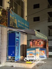  1 مظله او شمسيه باب المحل للبيع