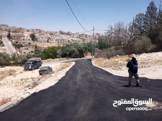  12 تعهدات عامة وهدم مباني ونقل جميع أنواع مواد البناء ونقل تراب أحمر وتعبيد الشوارع بأفضل أنواع الخلطة